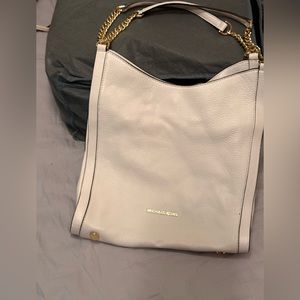 Michael Kors, white purse with partial gold chain handles